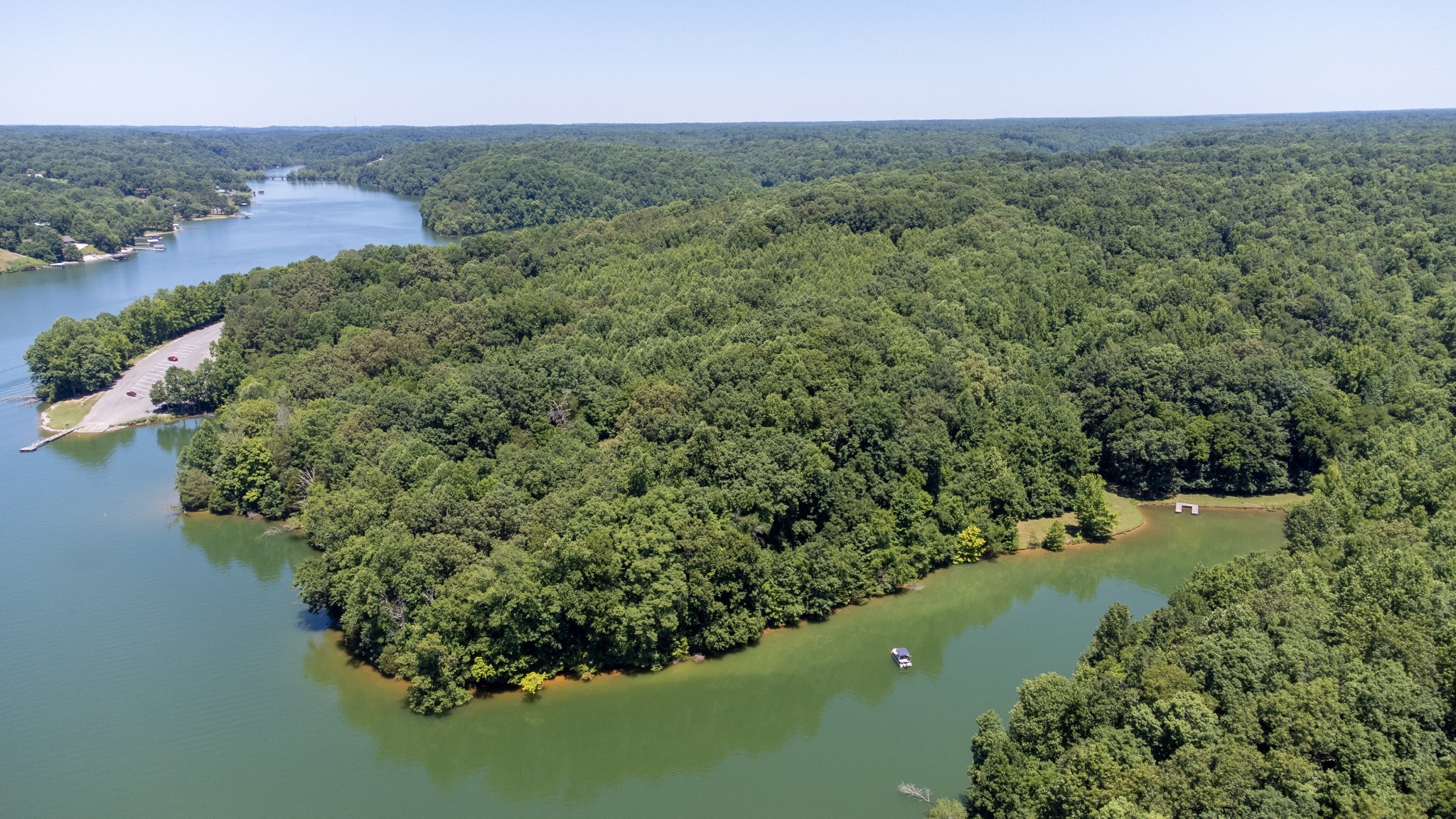 0 Turkey Creek Boat Dock Road Tullahoma, TN 37388 - Photo 20 of 39 an aerial view of green landscape with trees houses and lake view