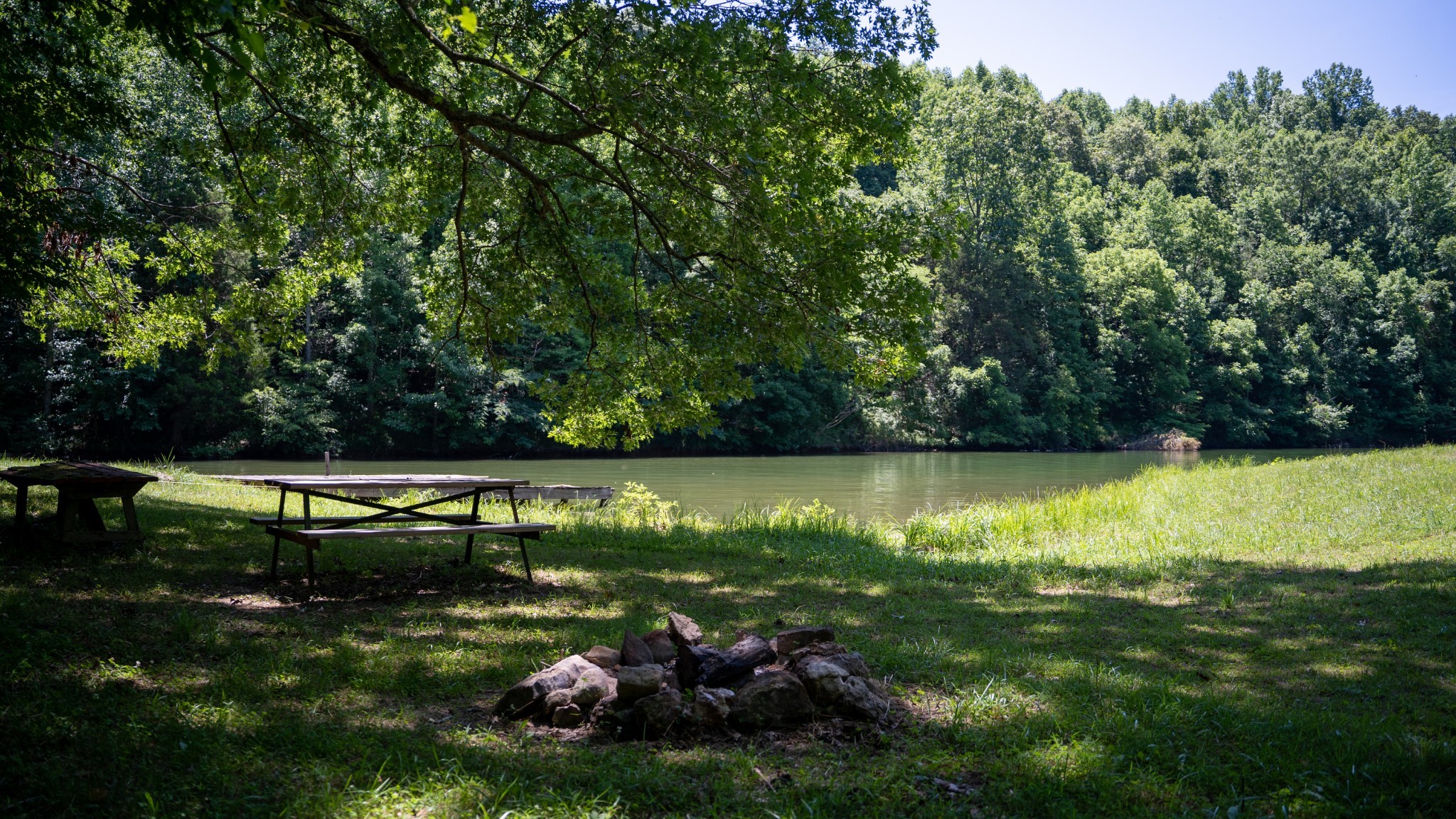 0 Turkey Creek Boat Dock Road Tullahoma, TN 37388 - Photo 2 of 39 a view of a lake with lawn chairs