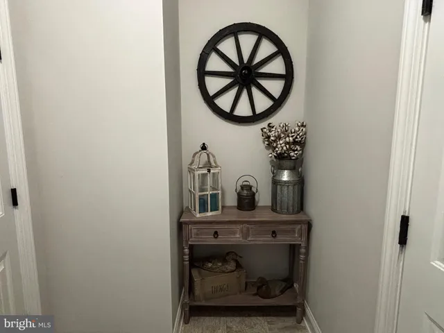 a kitchen with refrigerator cabinets dining table and chairs
