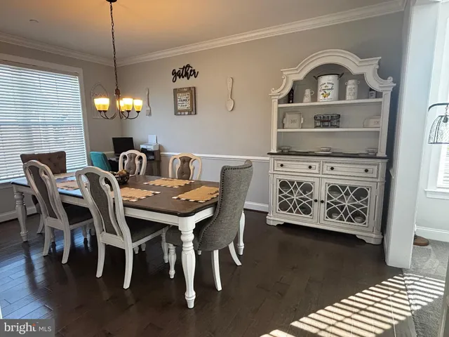a bath tub sitting in a bathroom next to a window