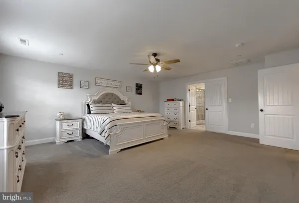 a view of empty room with wooden ceiling