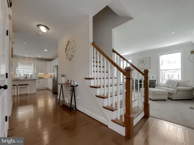 a bathroom with a sink toilet and mirror