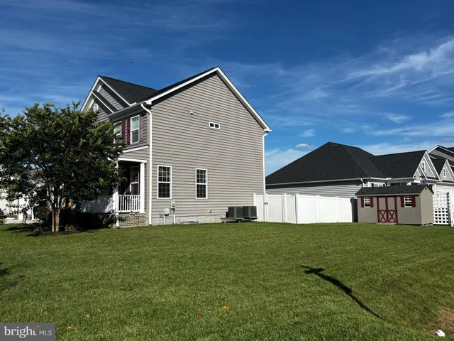 a front view of house with yard