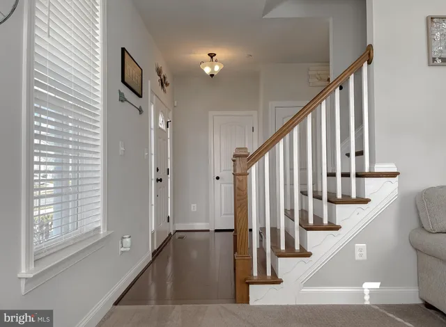 a spacious bedroom with a bed and a couch
