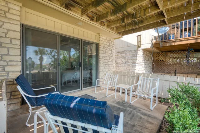 a view of a chairs and table on the wooden floor