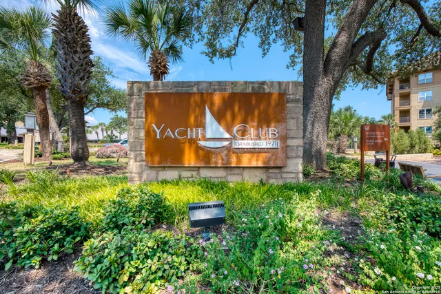 a view of swimming pool with a patio