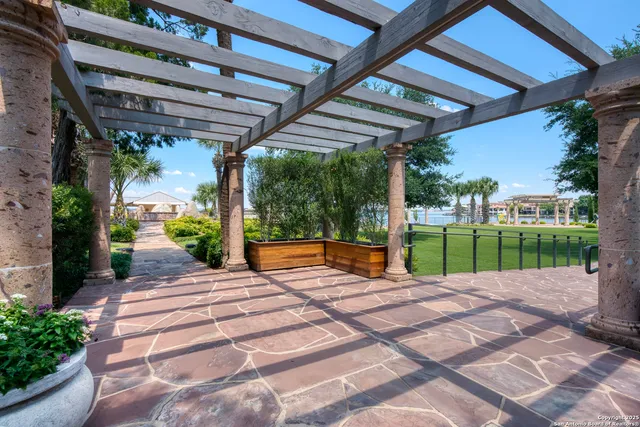 a view of a park with large trees