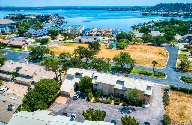an aerial view of a house with a garden