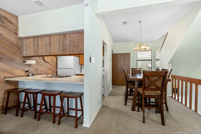 a view of a dining room with furniture