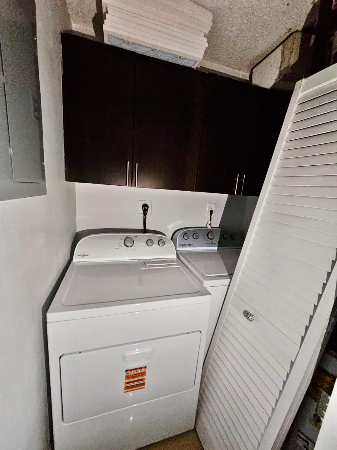 5820 Albert Road West Palm Beach, FL 33415 - Photo 12 of 14 a utility room with dryer and washer