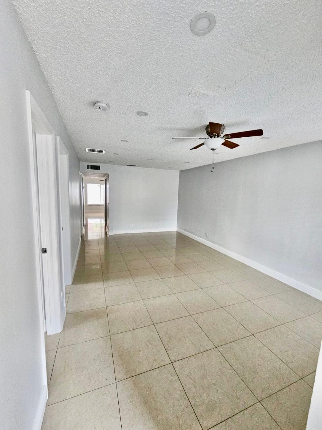 5820 Albert Road West Palm Beach, FL 33415 - Photo 6 of 14 a view of a livingroom with wooden cabinets