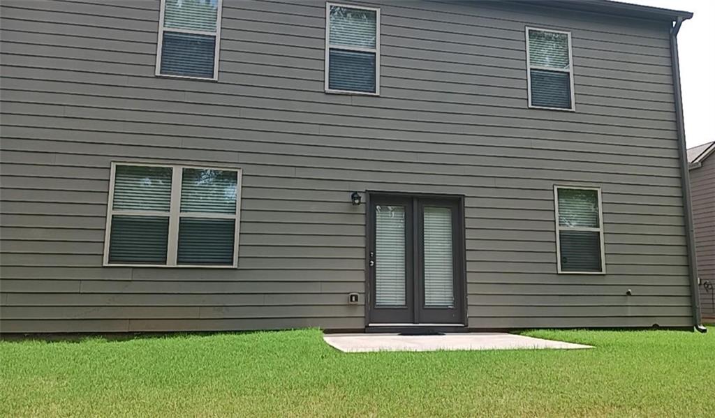 1033 Eldon Lane Fairburn, GA 30213 - Photo 3 of 21 a front view of a house
