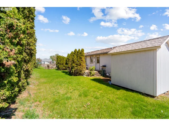 a view of a house with a patio