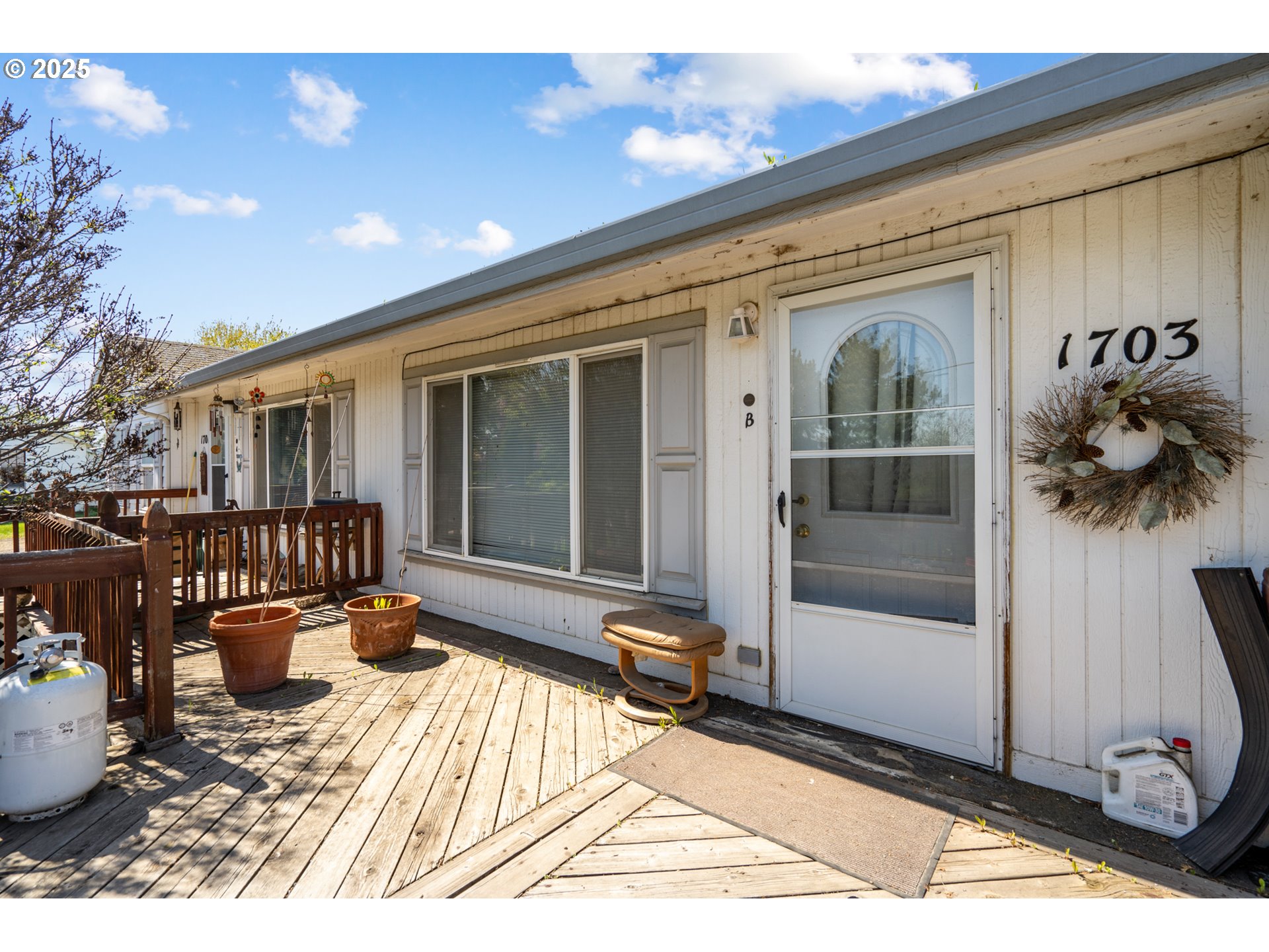 1675 Northwest 11th Street Hermiston, OR 97838 - Photo 26 of 33 a view of a house with a patio