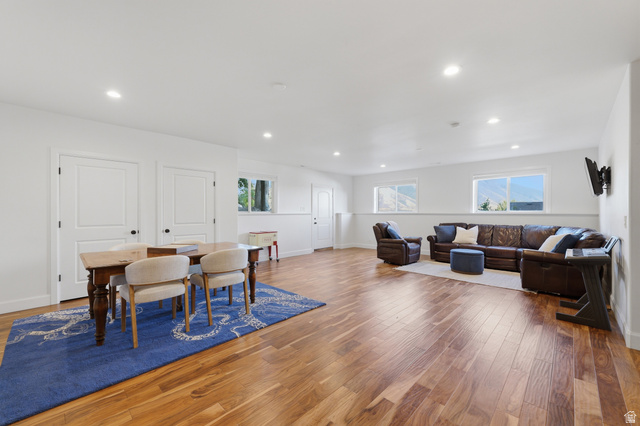441 South 2080th Street East Springville, UT 84663 - Photo 28 of 64 Spacious lower-level area featuring wood-finish flooring, recessed lighting, and multiple windows