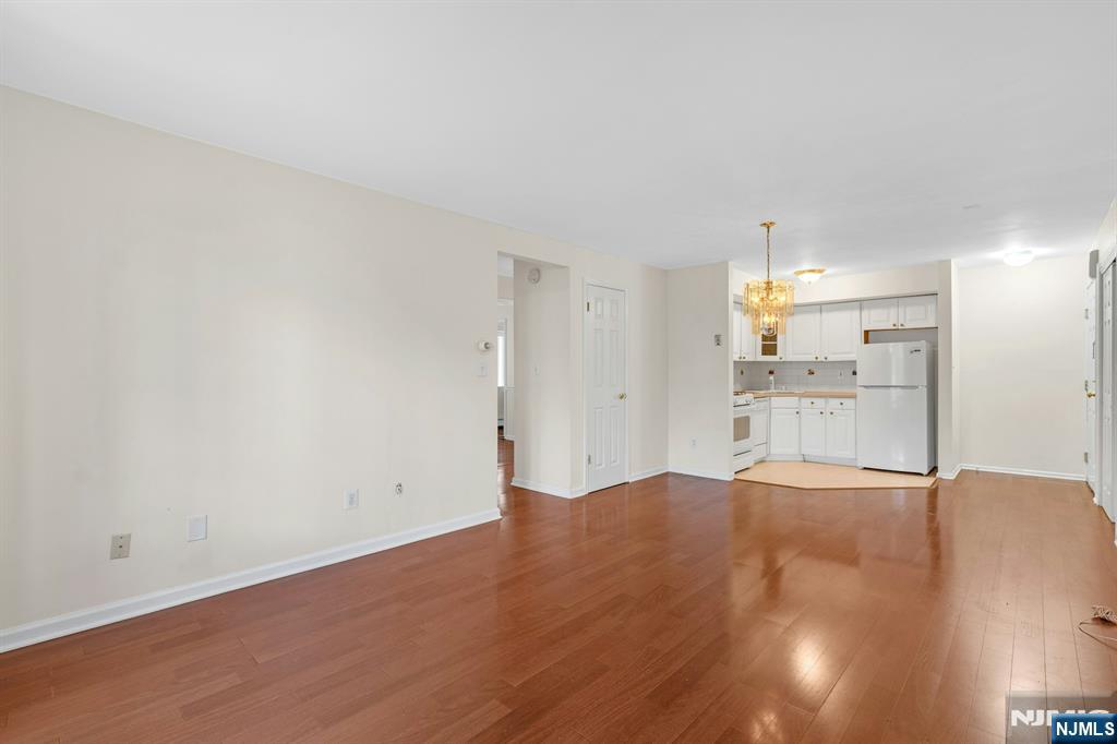 1419 Faulkner Court Mahwah, NJ 07430 - Photo 11 of 18 a view of a kitchen with a sink and a refrigerator