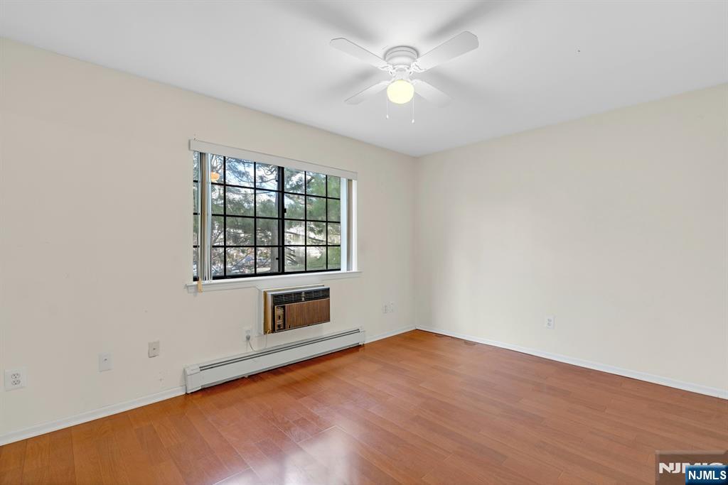 1419 Faulkner Court Mahwah, NJ 07430 - Photo 13 of 18 an empty room with windows and closet