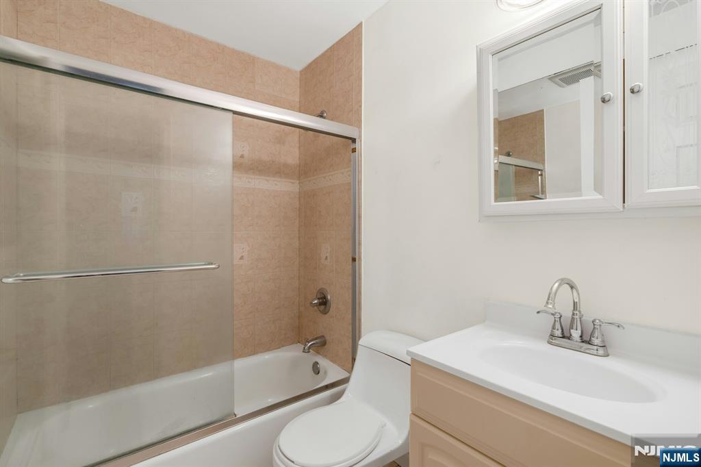 1419 Faulkner Court Mahwah, NJ 07430 - Photo 17 of 18 a bathroom with a sink toilet and shower