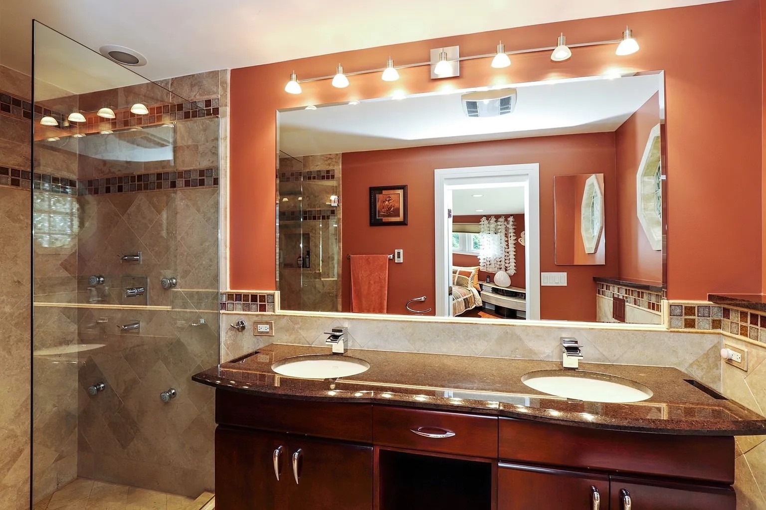 1122 Estate Lane Lake Forest, IL 60045 - Photo 15 of 26 a bathroom with a granite countertop sink a large mirror and a shower