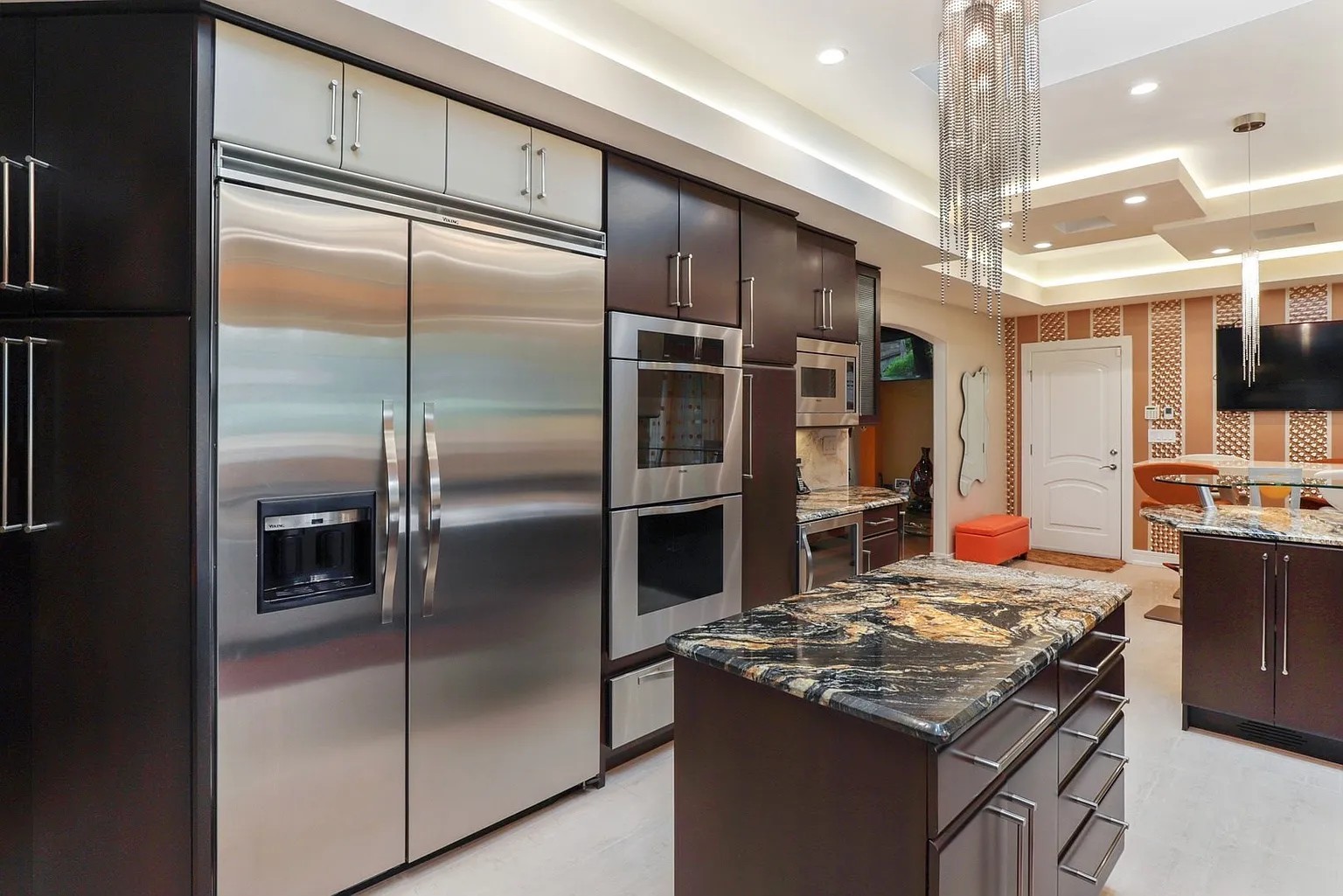 1122 Estate Lane Lake Forest, IL 60045 - Photo 7 of 26 a kitchen with kitchen island a counter top space a sink stainless steel appliances and cabinets