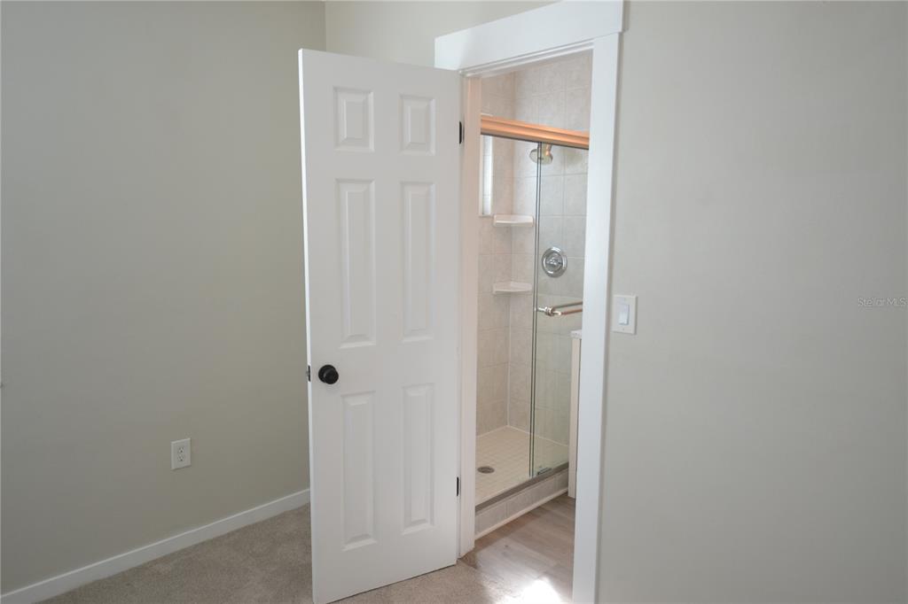 746 Barbara Street Palm Harbor, FL 34684 - Photo 13 of 54 a view of a bathroom with white door
