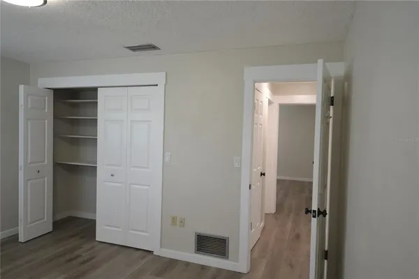 a view of a bathroom with a glass door