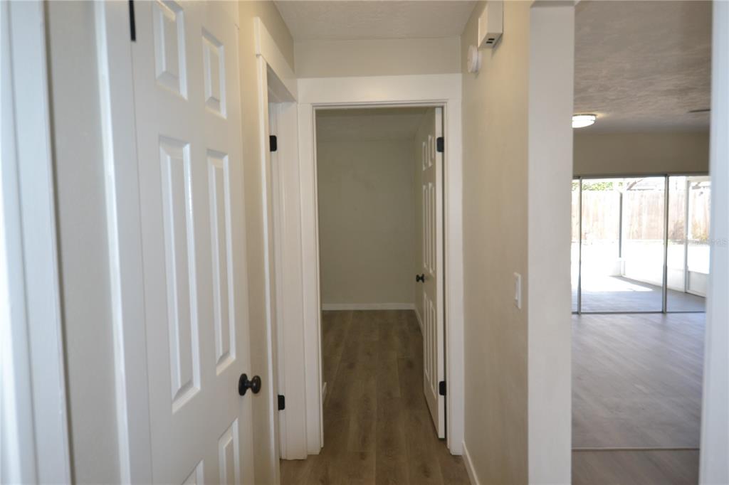 746 Barbara Street Palm Harbor, FL 34684 - Photo 20 of 54 a view of a bathroom with a glass door