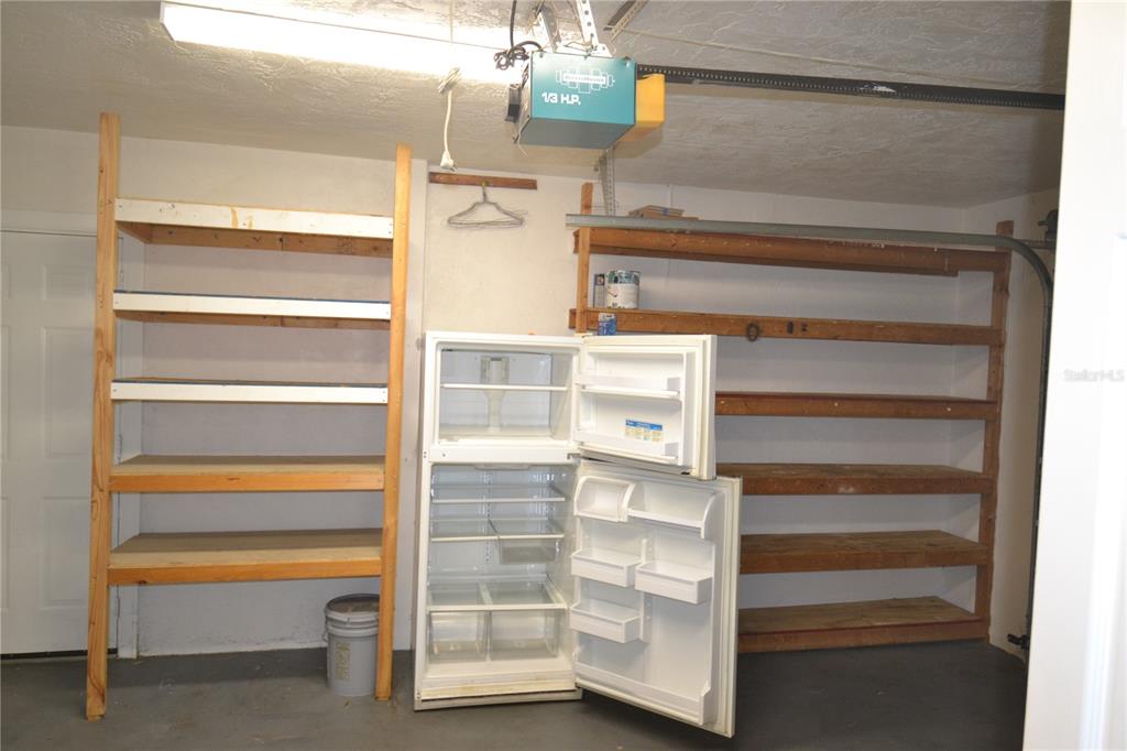 746 Barbara Street Palm Harbor, FL 34684 - Photo 34 of 54 a view of walk in closet with empty racks