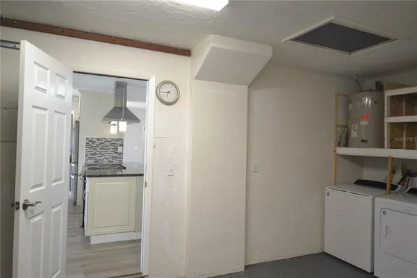 a view of an empty room and window