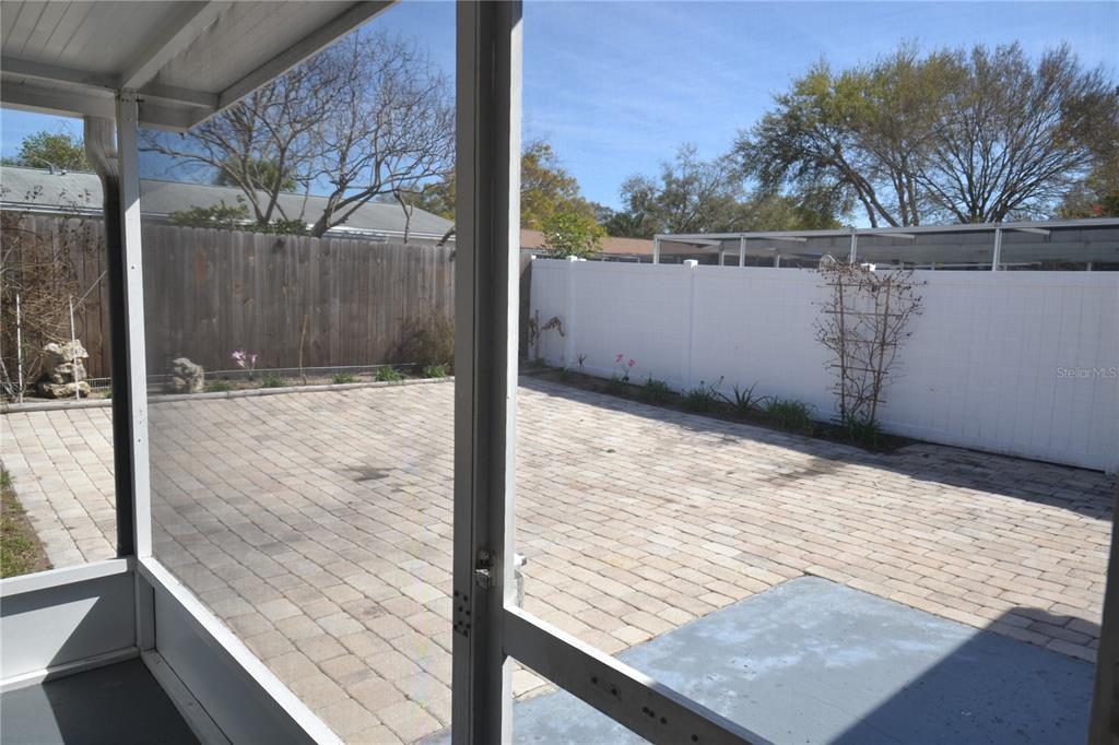 746 Barbara Street Palm Harbor, FL 34684 - Photo 41 of 54 a view of a backyard of a house