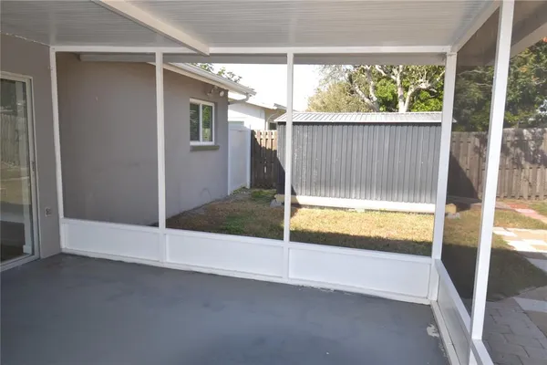 a view of a backyard of a house