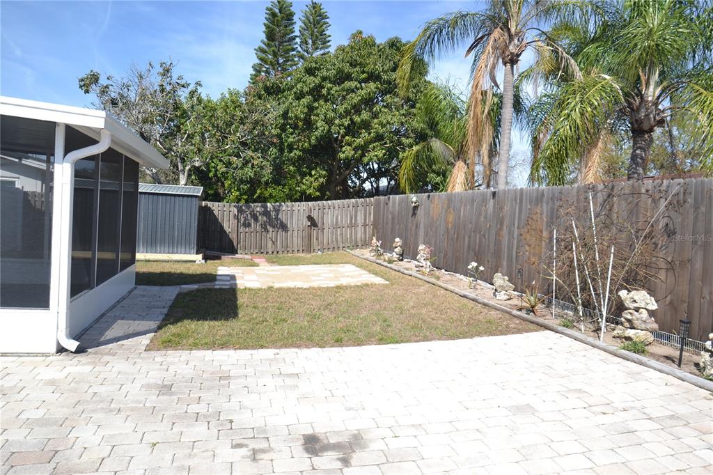 746 Barbara Street Palm Harbor, FL 34684 - Photo 49 of 54 a view of a backyard of a house