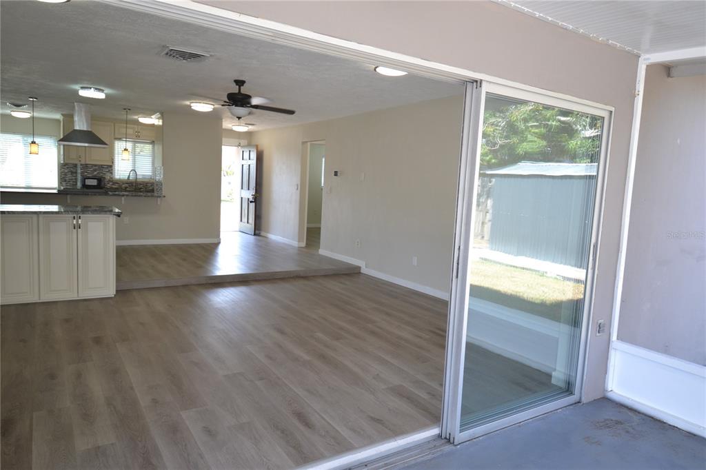 746 Barbara Street Palm Harbor, FL 34684 - Photo 52 of 54 a view of an empty room with kitchen and a window
