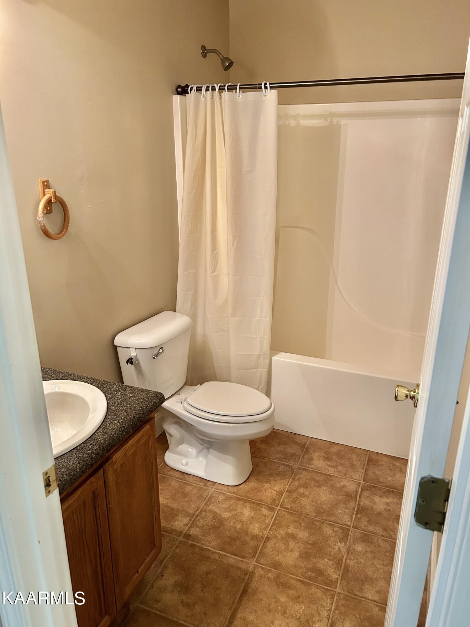 2309 Big Springs Road Maryville, TN 37801 - Photo 14 of 19 a bathroom with a toilet a sink and a shower
