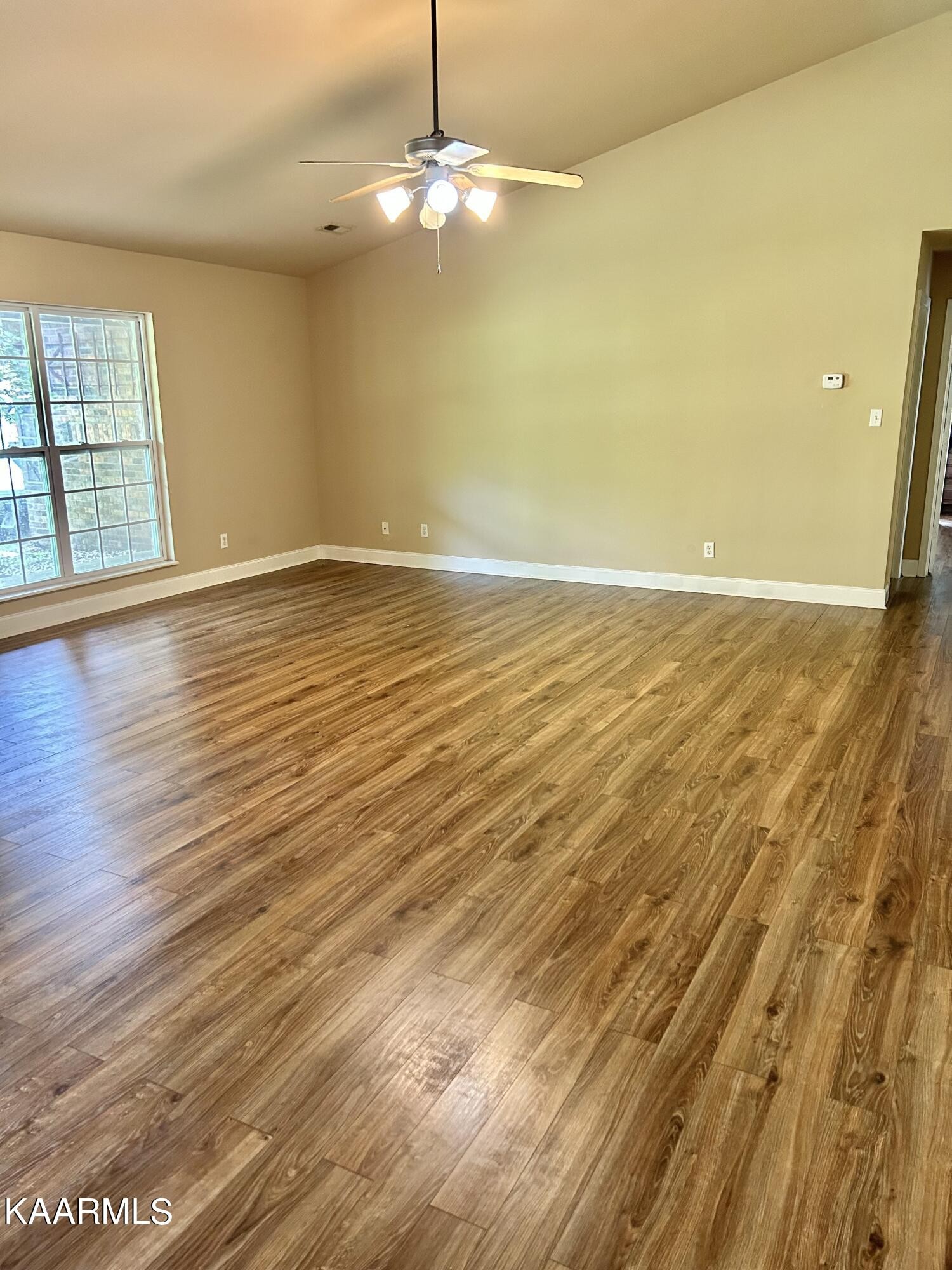 2309 Big Springs Road Maryville, TN 37801 - Photo 6 of 19 wooden floor in an empty room with a window