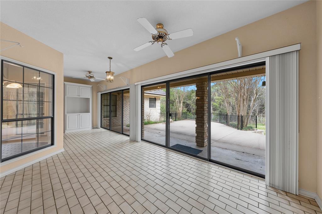 2510 Oak Ridge Clifton, TX 76634 - Photo 11 of 26 a view of a room with wooden floor and balcony