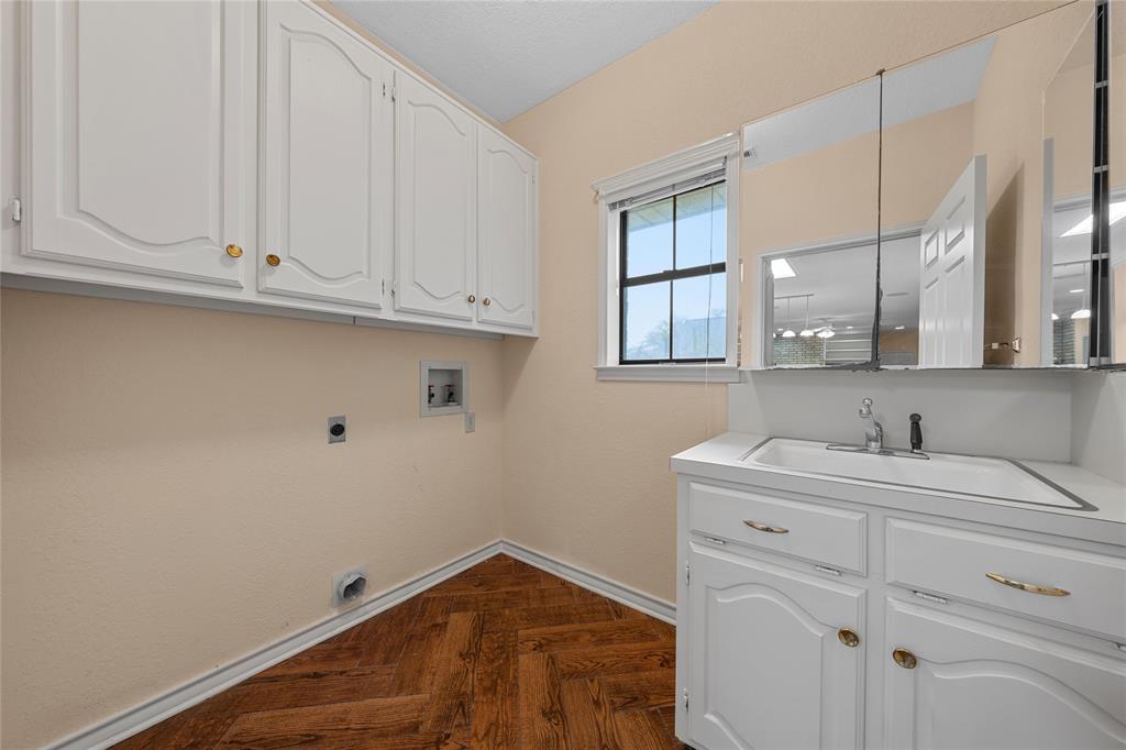 2510 Oak Ridge Clifton, TX 76634 - Photo 12 of 26 a bathroom with a sink and a mirror