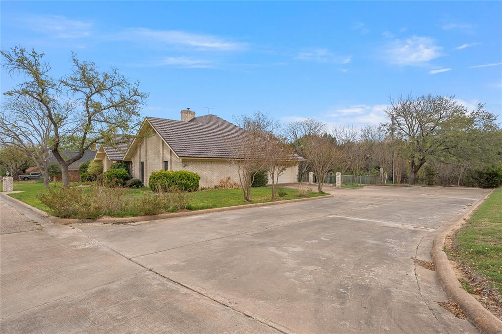 2510 Oak Ridge Clifton, TX 76634 - Photo 22 of 26 a view of a house with a yard