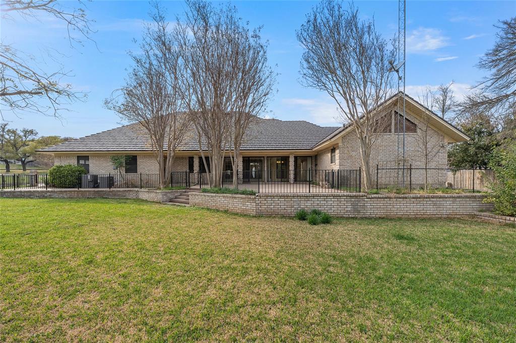 2510 Oak Ridge Clifton, TX 76634 - Photo 25 of 26 a front view of a house with a garden