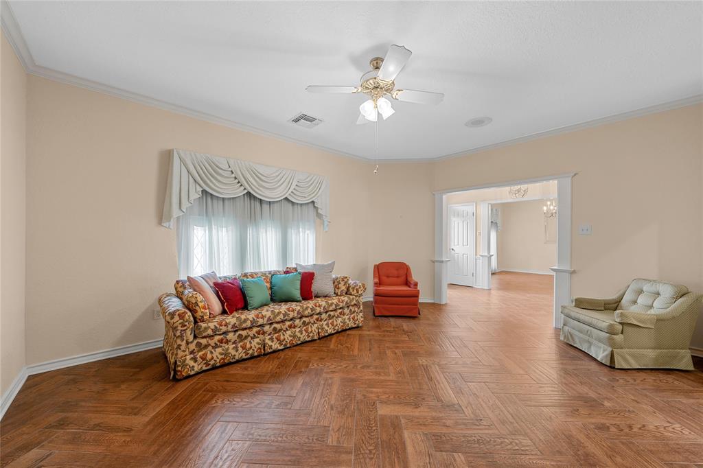 2510 Oak Ridge Clifton, TX 76634 - Photo 5 of 26 a living room with furniture and a chandelier