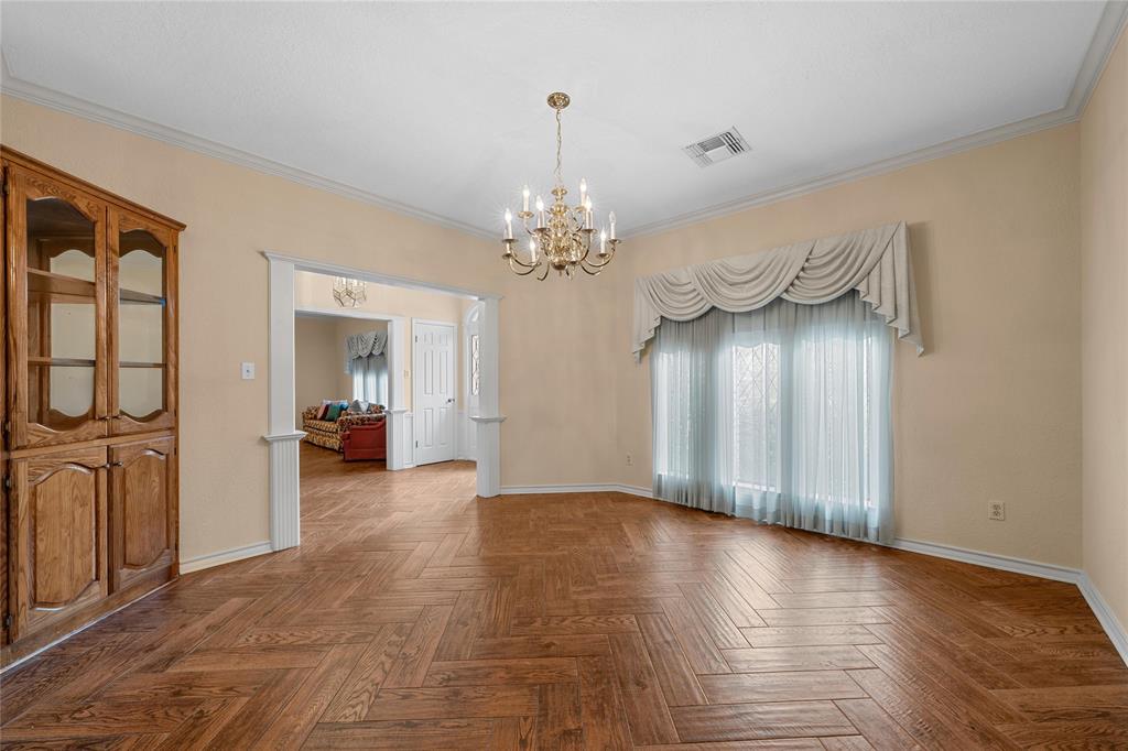 2510 Oak Ridge Clifton, TX 76634 - Photo 10 of 26 a view of a livingroom with furniture and chandelier