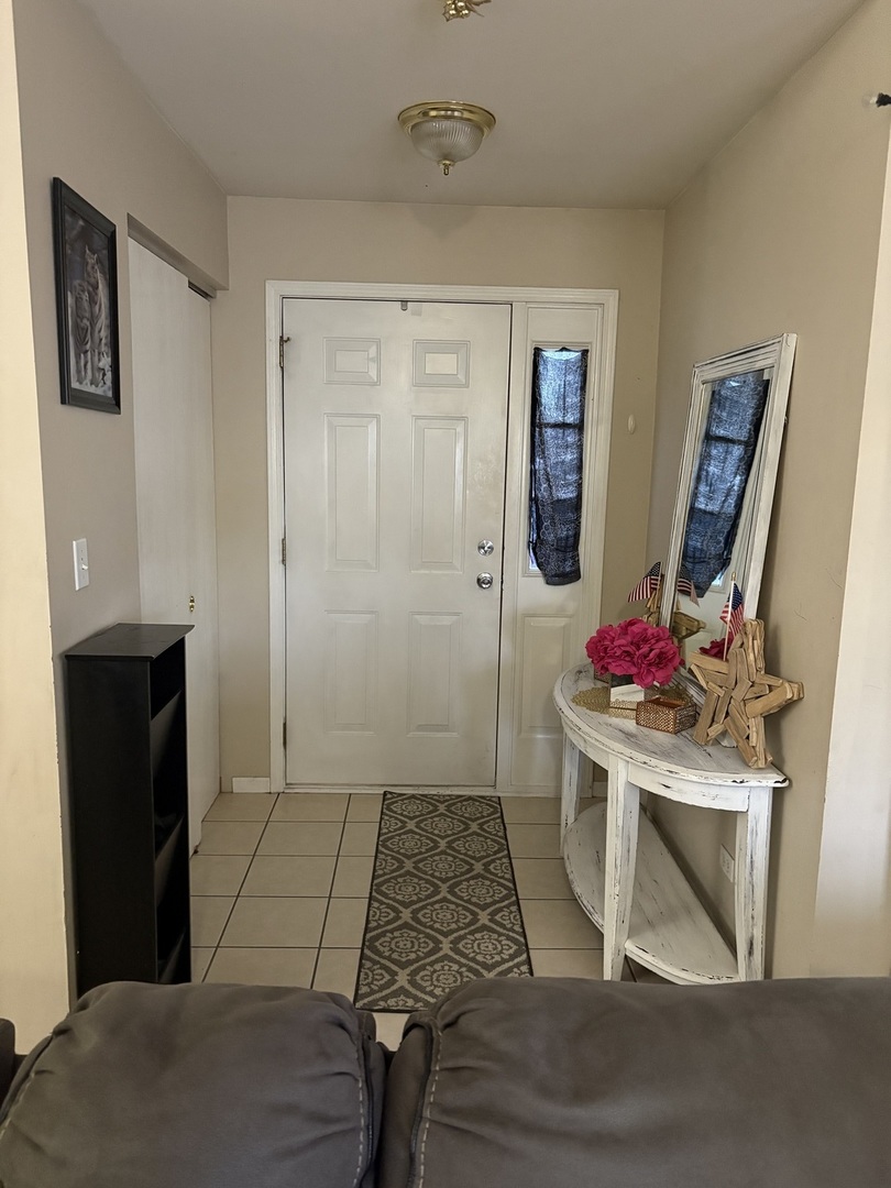 561 Sandy Court Harvard, IL 60033 - Photo 2 of 14 a room with a window and storage