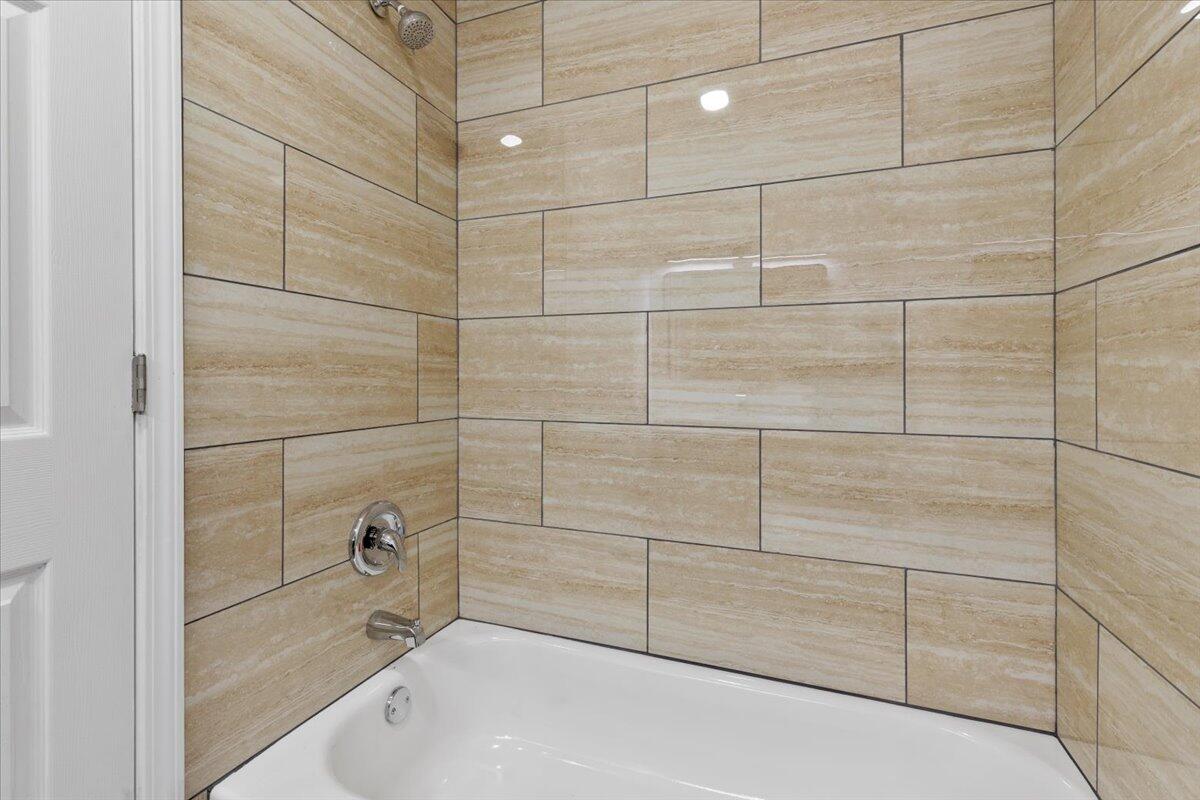 127 State Pulaski, VA 24301 - Photo 31 of 35 a bathroom with a bathtub and shower
