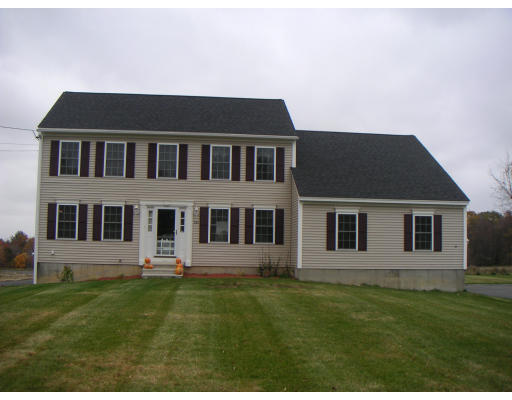 326 S Road Templeton, MA 01468 - Photo 1 of 8 a front view of a house with a garden