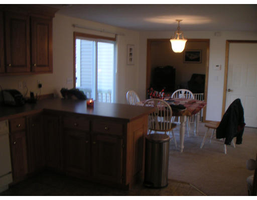326 S Road Templeton, MA 01468 - Photo 3 of 8 a living room with furniture and a wooden floor