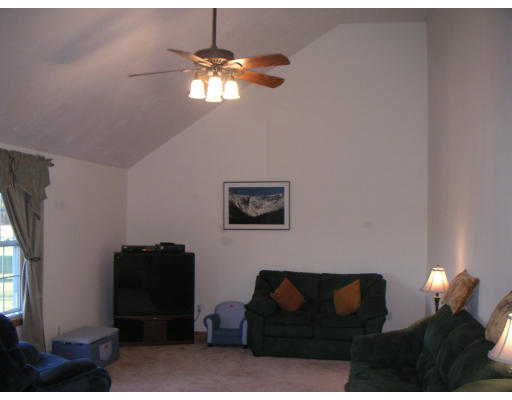 326 S Road Templeton, MA 01468 - Photo 4 of 8 a living room with furniture and a lamp