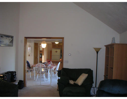 326 S Road Templeton, MA 01468 - Photo 5 of 8 a view of a dining room with furniture and a chandelier fan