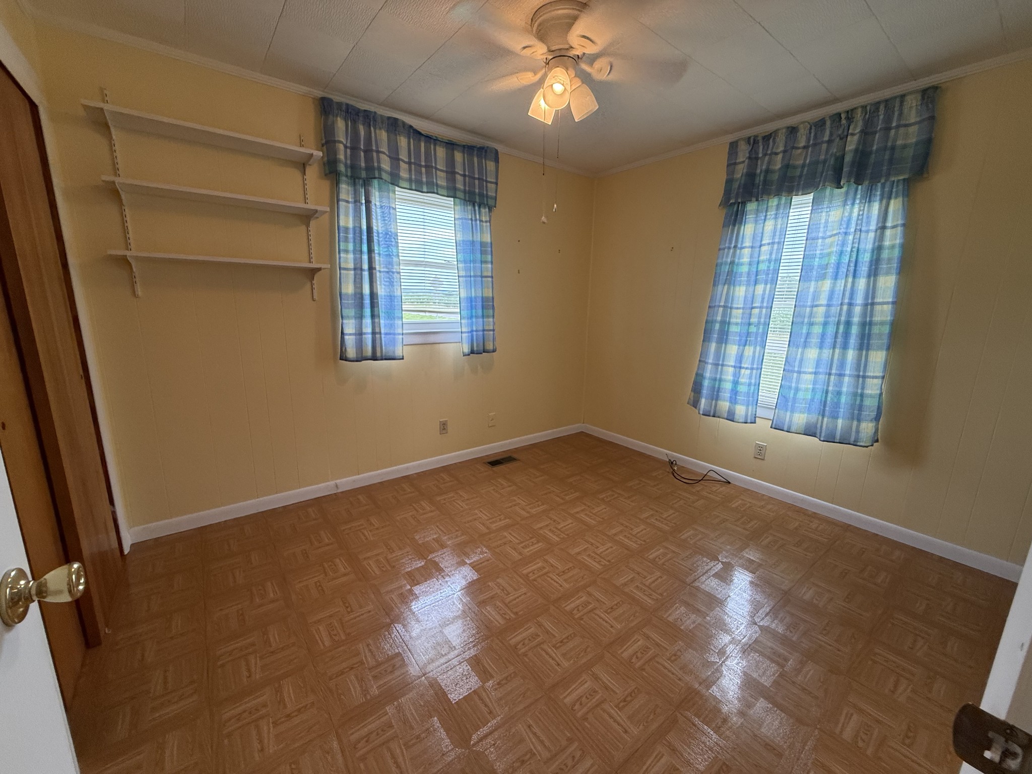 2971 Monroe Floyd Road Decherd, TN 37324 - Photo 12 of 26 a view of empty room with wooden floor and fan