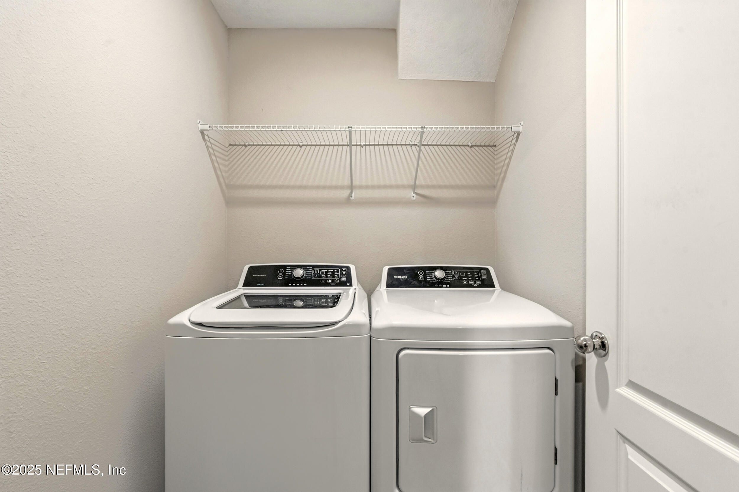 1330 Salt Ridge Avenue Jacksonville, FL 32218 - Photo 20 of 30 a utility room with dryer and washer