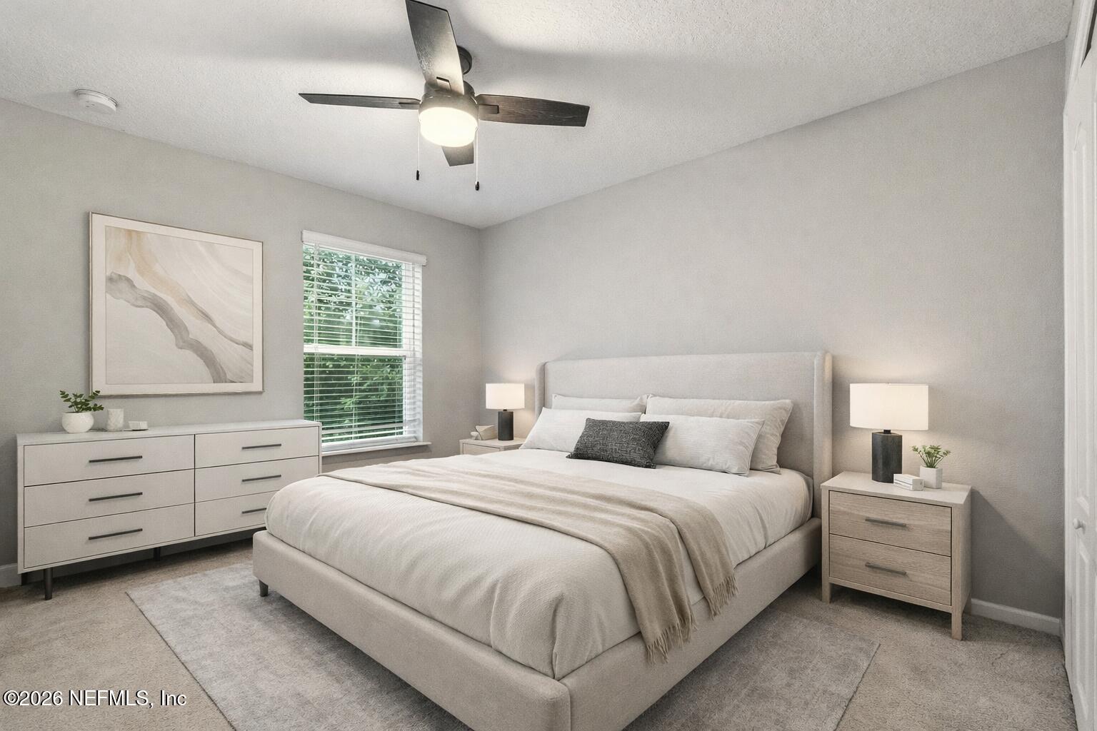 1330 Salt Ridge Avenue Jacksonville, FL 32218 - Photo 9 of 30 a bedroom with a bed and a dresser